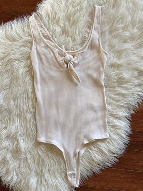 NWOT TWIK by SIMONS off white ribbed tie front bodysuit size XS